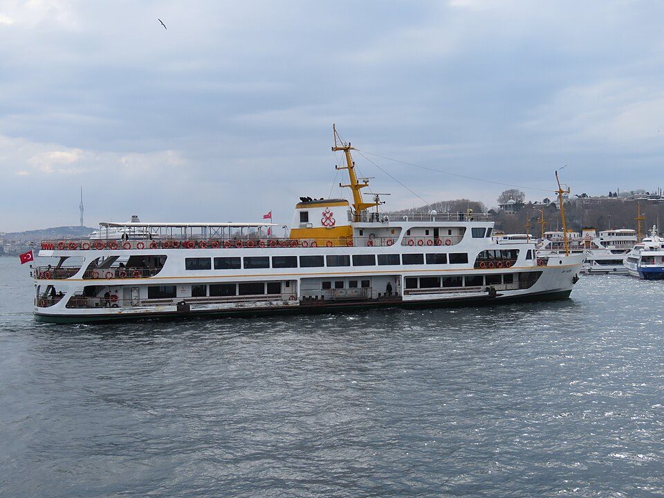 The passenger ferry ŞH-Fatih approaches Eminönü, with Istanbul’s waterfront behind it.