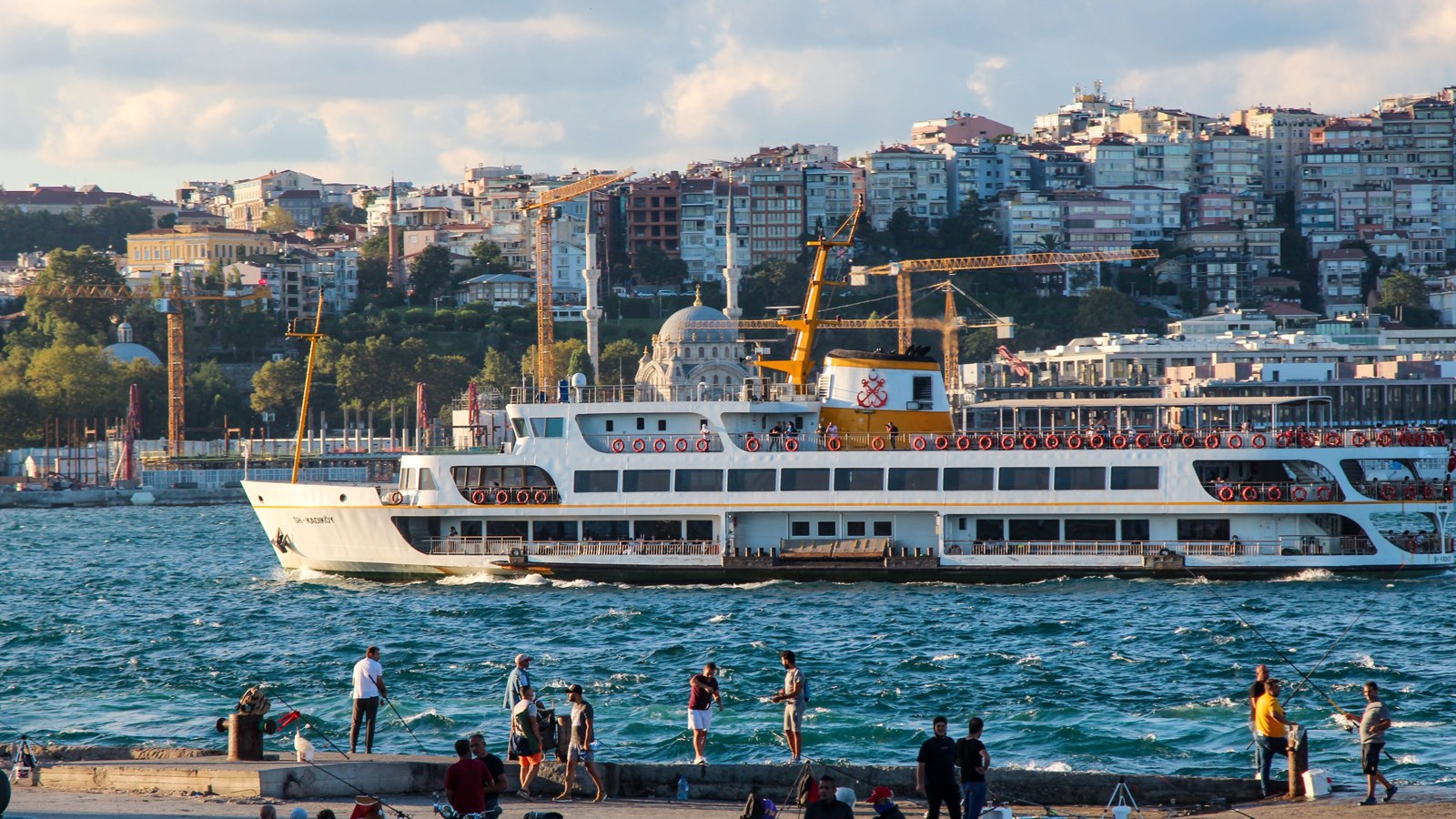 A passenger ferry on the Bosphorus below Cihangir, June 2025. An illustration of ferry travel, not a confirmed sailing on the routes below.
