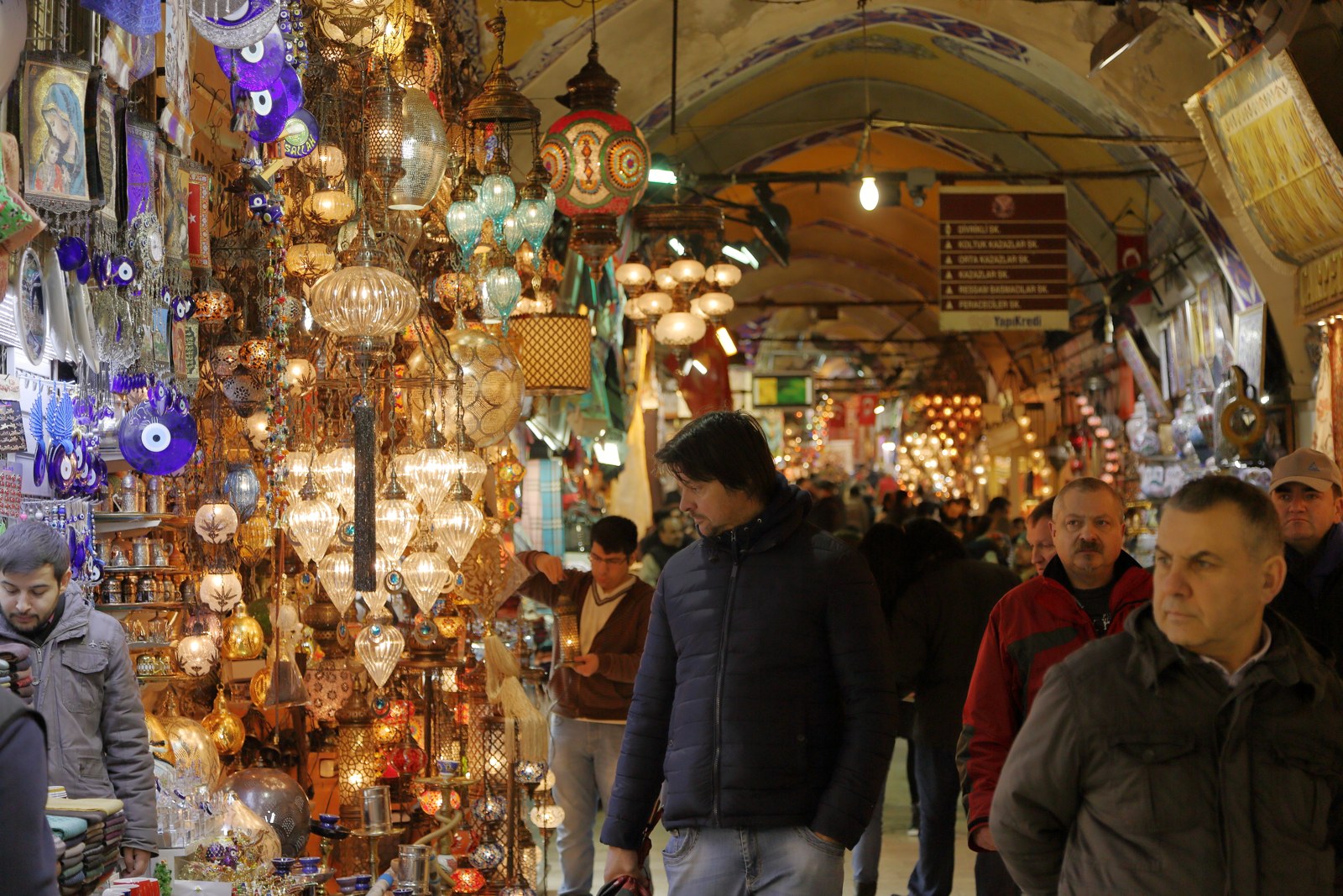 A lamp seller's display and shoppers in Istanbul's Grand Bazaar, photographed in 2014.