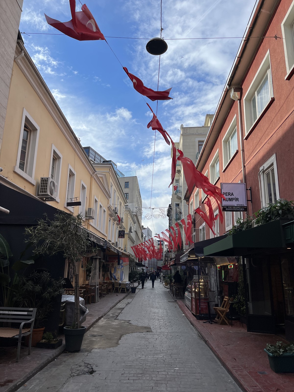Cafés and small frontages on Mumhane Street in Karaköy, photographed in November 2023.