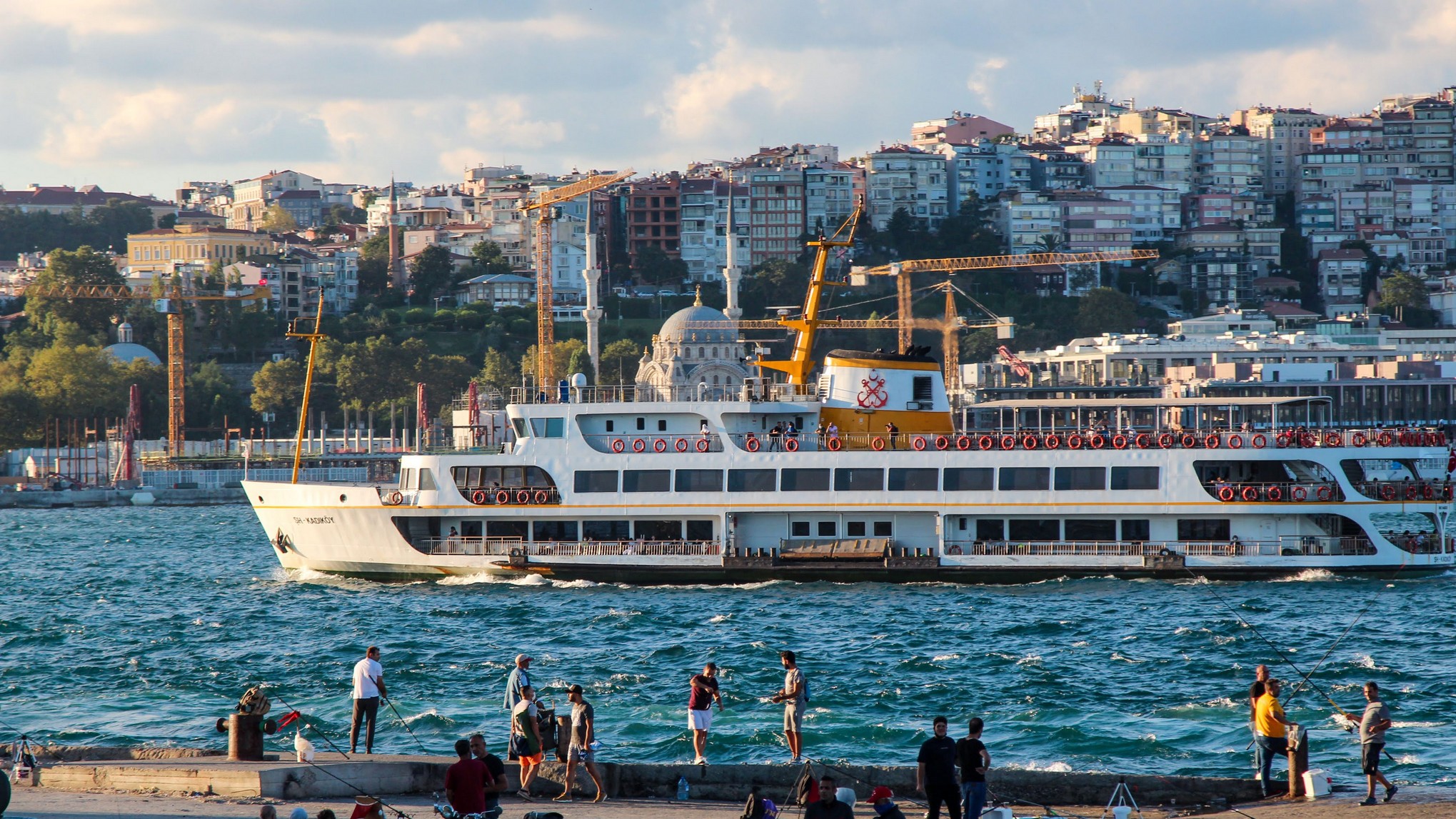 A public ferry passes Istanbul’s waterfront.